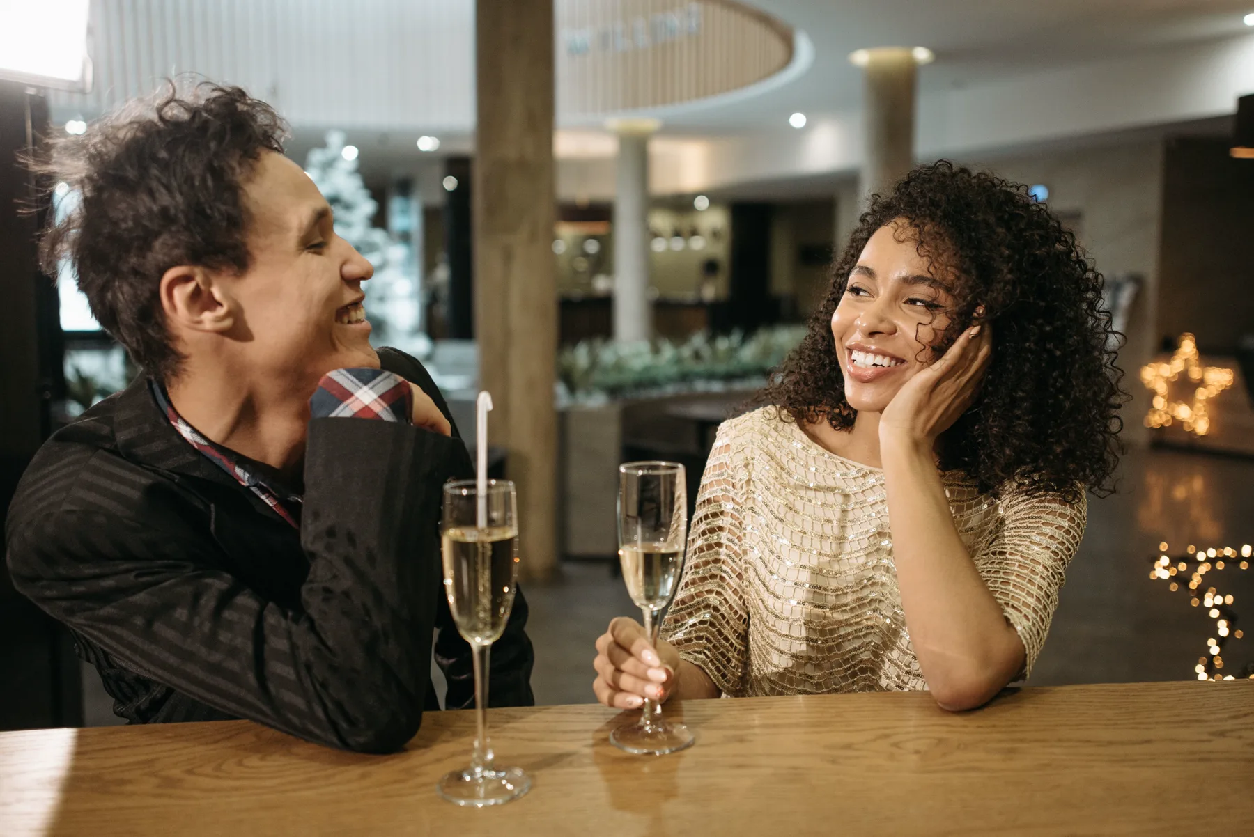Friends enjoying drinks together at a bar